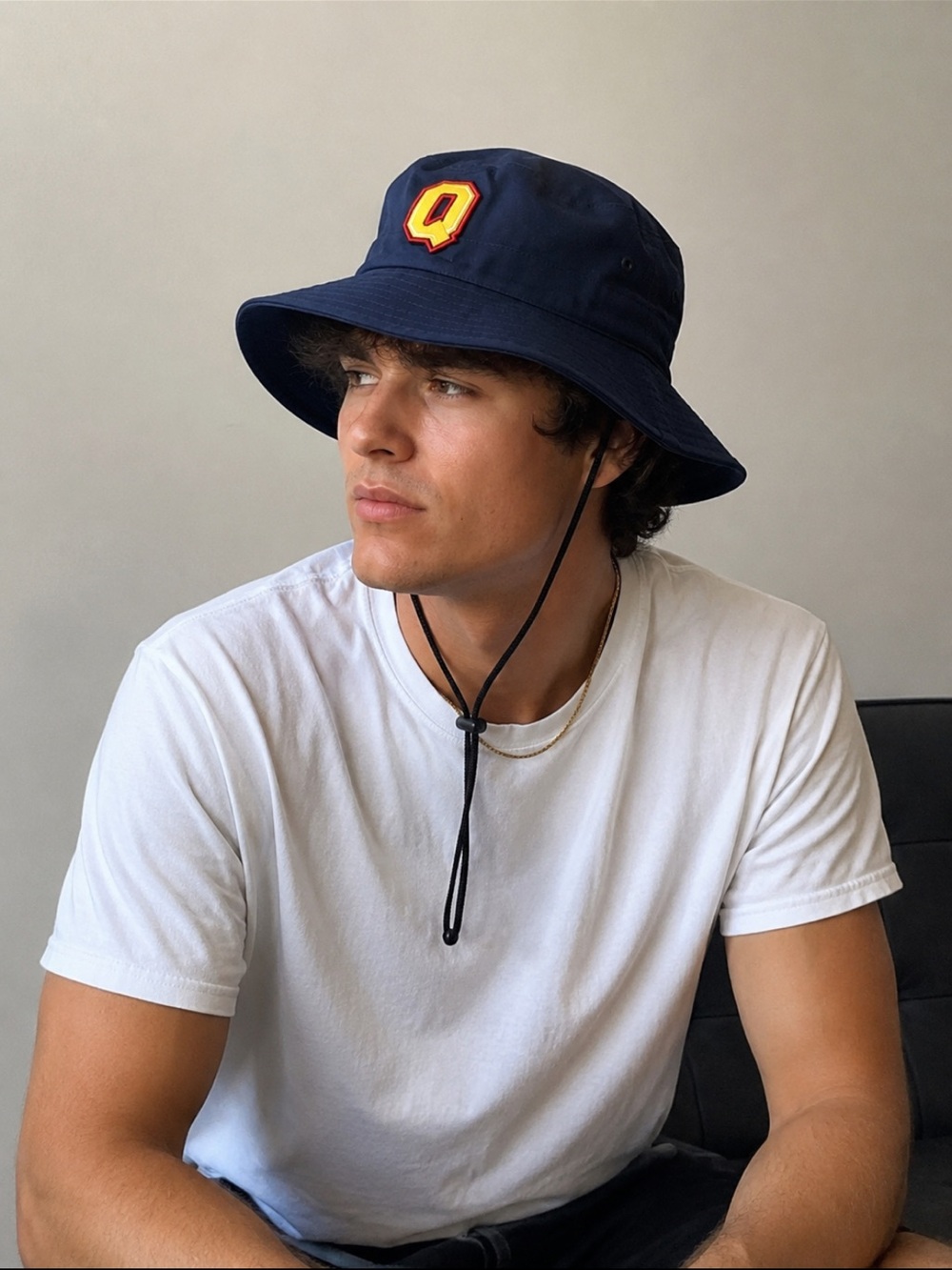 Queen’s University Navy Bucket Hat with Yellow Q Patch